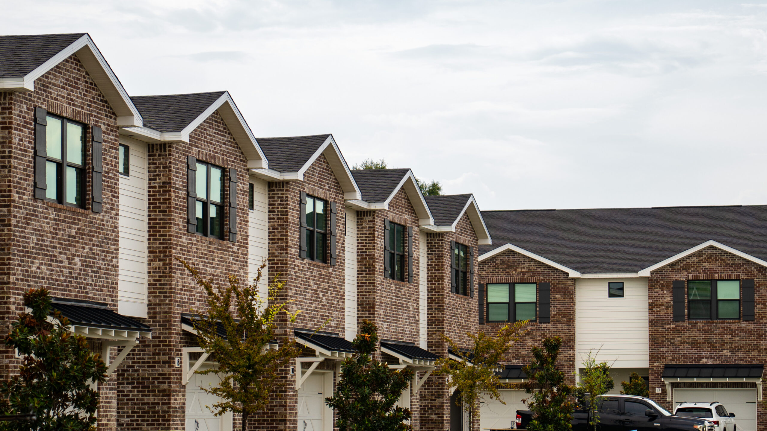 Architectural Facade of Adjoining Townhomes and Driveways